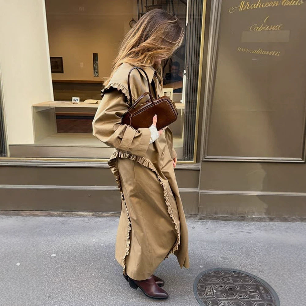 Damen maxilanger Trenchcoat mit Volant‑Schultercape und verstellbaren Manschetten Shop Nory