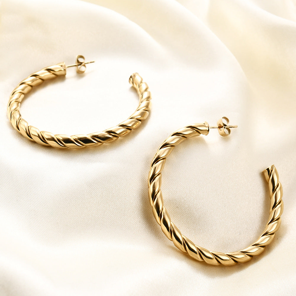 Damen Creolen mit gedrehtem Design und elegantem Finish Shop Nory