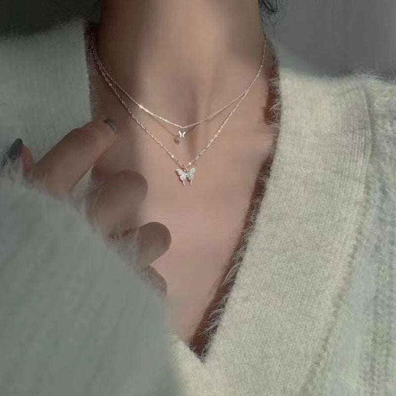 Damen Halskette mit funkelndem Schmetterlingsanhänger aus hochwertigem Edelstahl Shop Nory
