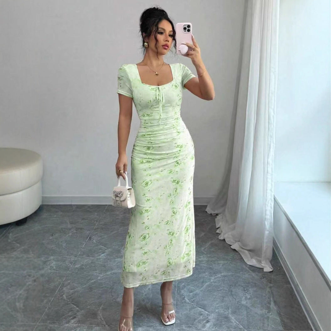 Damen Midi-Kleid mit raffinierten Falten und floralem Muster
