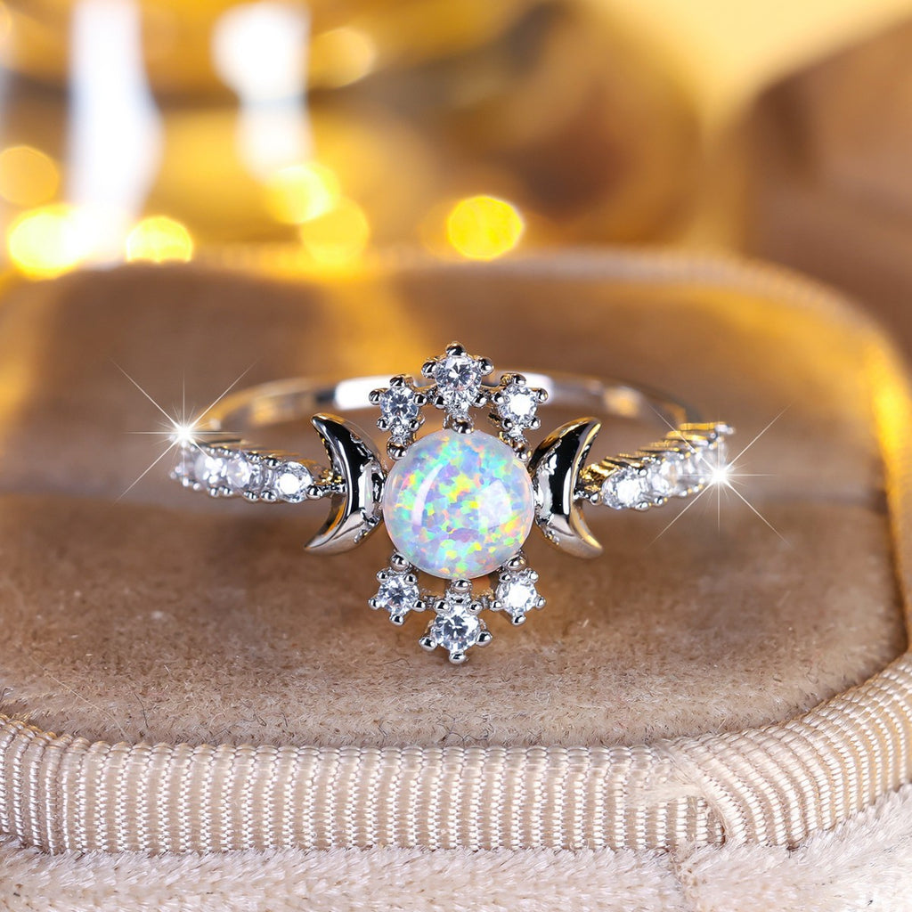 Damen Ring mit schimmerndem Opalsteinglanz und funkelnden Zirkonia-Elementen Shop Nory