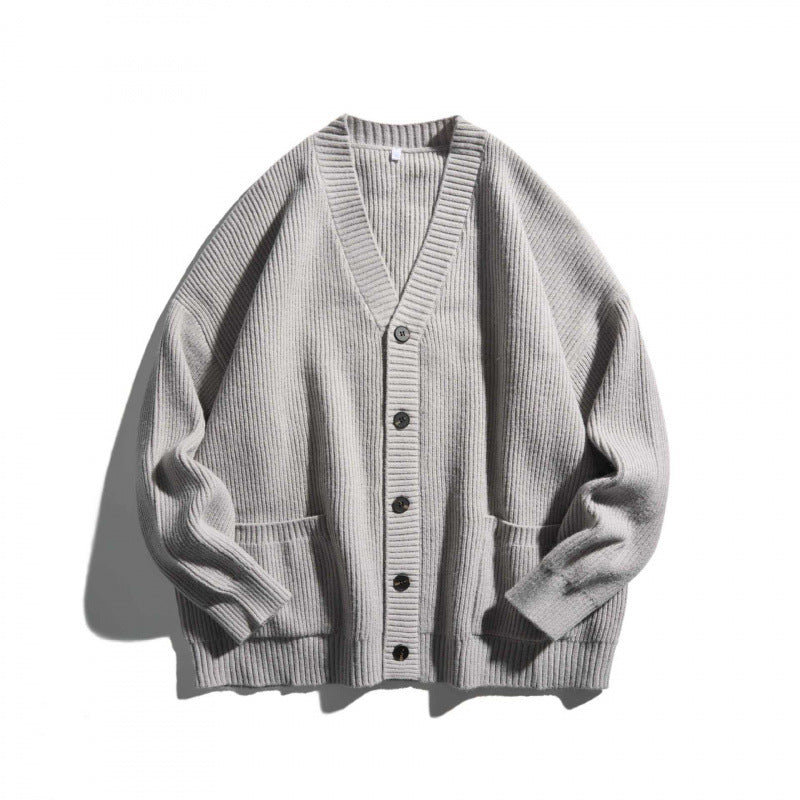 Unisex Oversize-Feinstrick-Cardigan mit V-Ausschnitt, Knopfleiste und aufgesetzten Taschen Shop Nory
