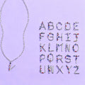 Damen Kettenanhänger mit bunten Buchstaben und funkelnden Kristallen Shop Nory