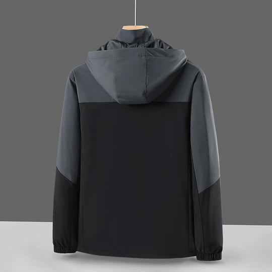 Herren Leichte Softshell-Windjacke mit Kapuze, wasserabweisender Membran und Reißverschlusstaschen Shop Nory