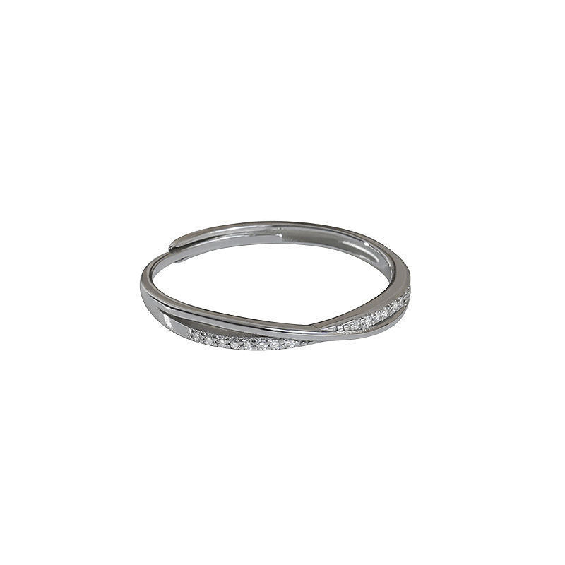 Damen filigraner Ring mit geschwungenem Design und funkelnden Zirkonia Shop Nory