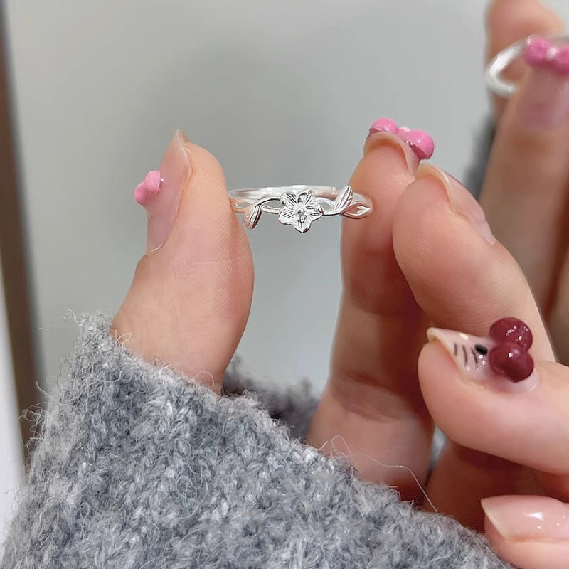 Damen filigraner Ring mit Blumendesign und elegantem Blattmotiv Shop Nory