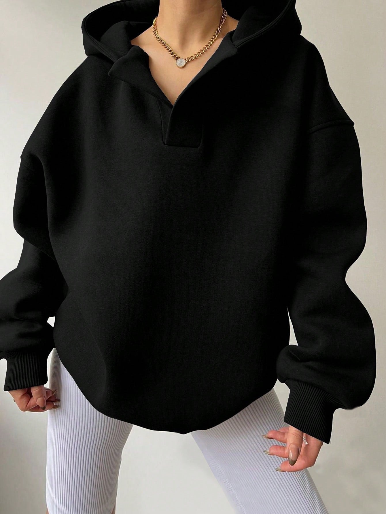 Damen Kapuzensweater mit übergroßem Schnitt und V-Ausschnitt