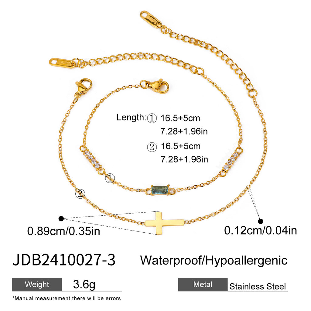 Damen Doppelarmband mit funkelnden Zirkonia und Kreuzanhänger Shop Nory
