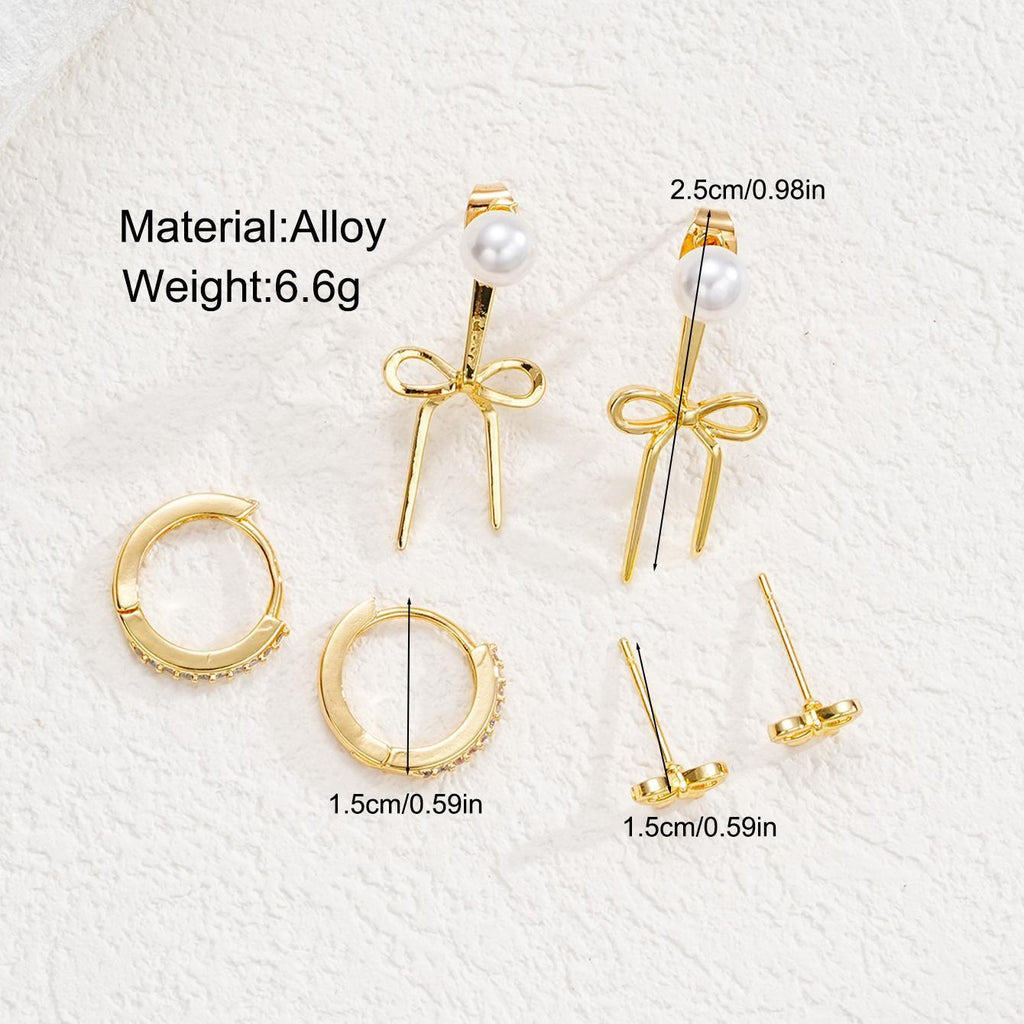 Damen Ohrstecker-Set mit funkelnden Schmuckelementen und eleganten Schleifen Shop Nory