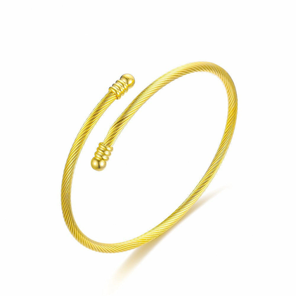 Damen Armreif mit stilvollem Herzanhänger aus hochwertigem Edelstahl Shop Nory