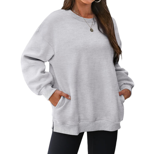 Damen nan verlängertes Oversize Rundhalspullover mit seitlichen Eingrifftaschen, Rippbündchen und überschnittener Schulter Shop Nory
