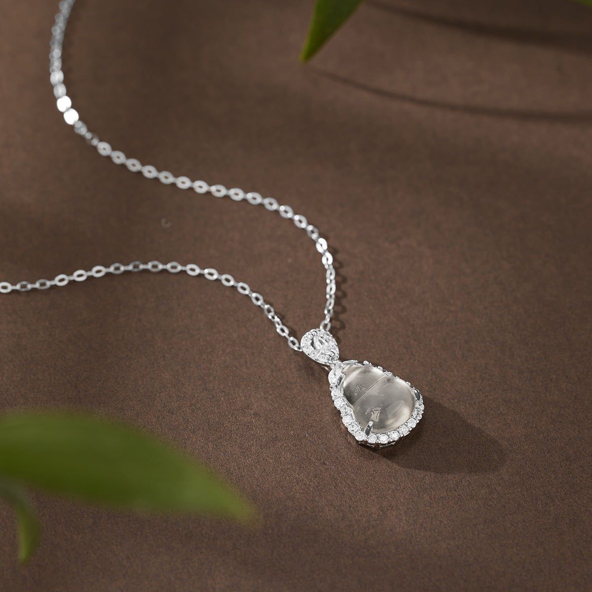 Damen elegante Halskette mit tropfenförmigem Anhänger und funkelnden Zirkonia Shop Nory