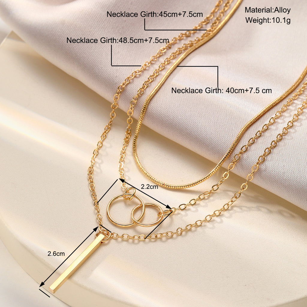 Damen mehrlagige Halskette mit runden Anhängern und elegantem Stangenakzent Shop Nory