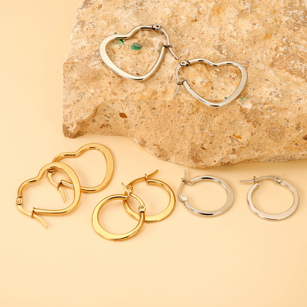 Damen Herzförmige Edelstahl Creolen mit goldplattierter Oberfläche Shop Nory