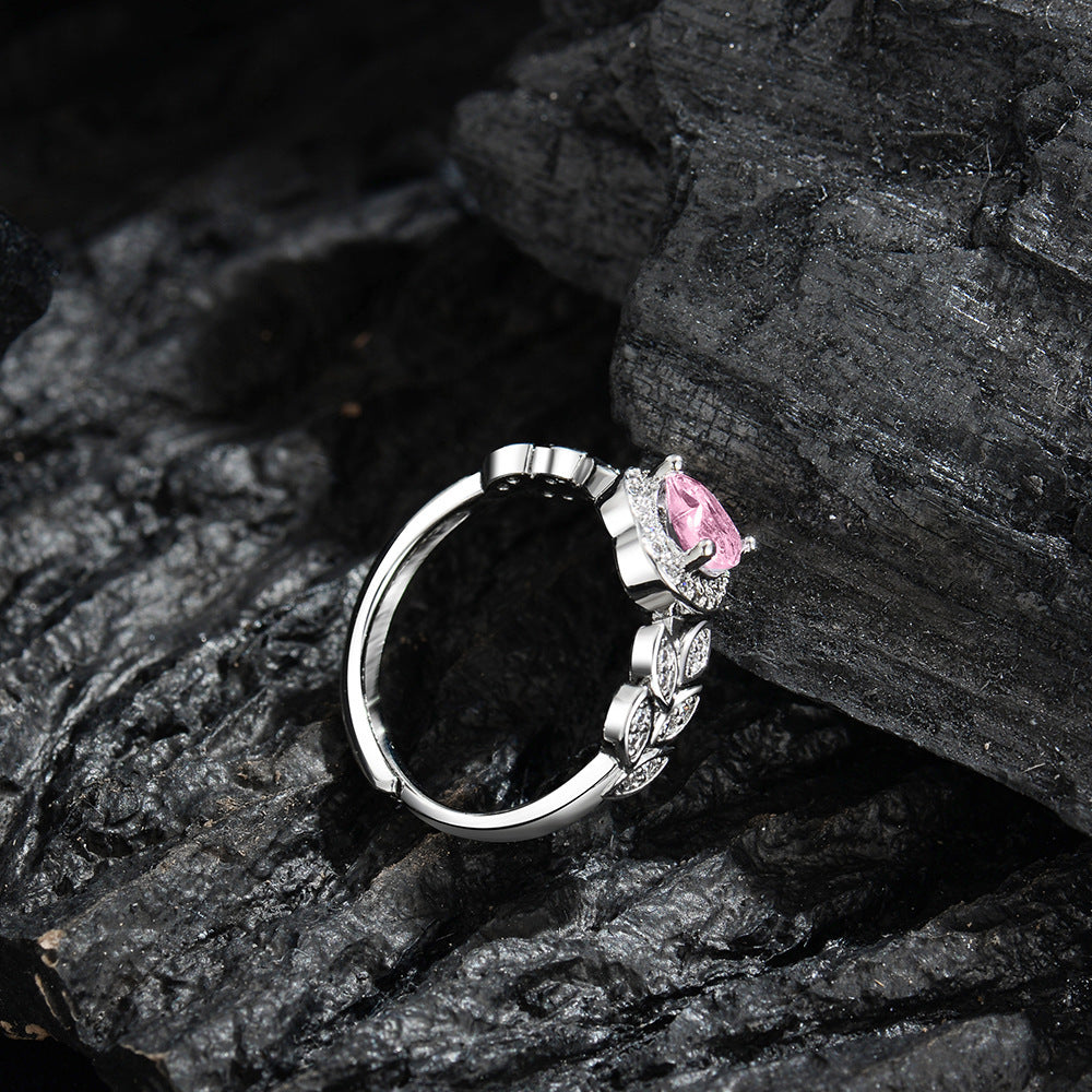 Damenring mit herzförmigem pinkem Zirkonia und floralem Design Shop Nory