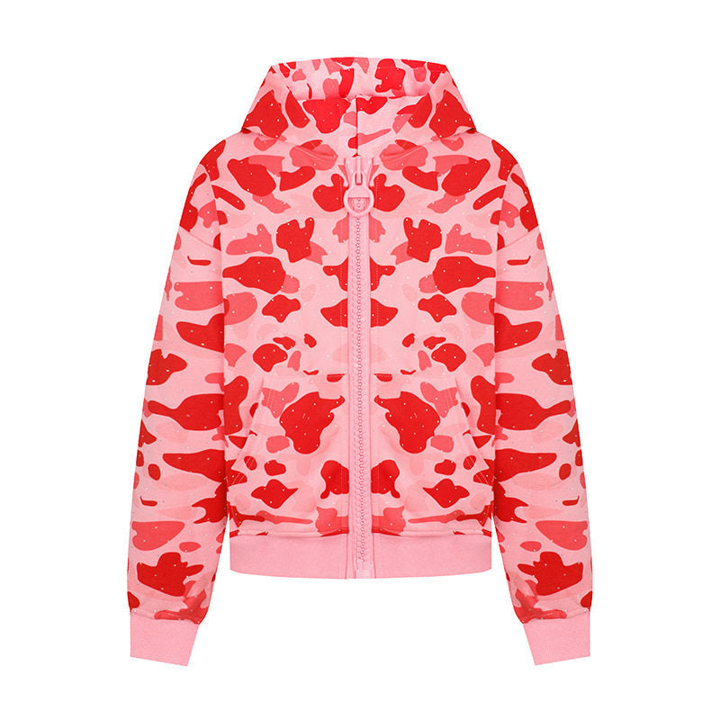 Damen Kapuzenjacke im Camouflage‑Print mit durchgehendem Reißverschluss, Kängurutasche und Rippbündchen Shop Nory