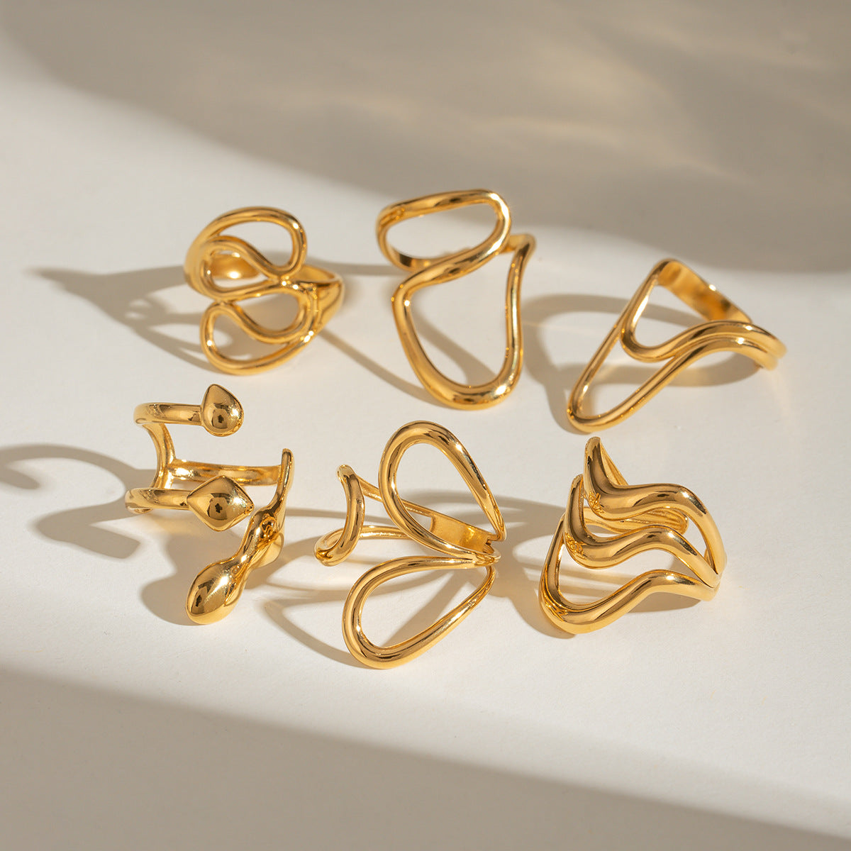 Damen Offenes Design-Armband mit elegantem Wellenmuster aus hypoallergenem Edelstahl Shop Nory