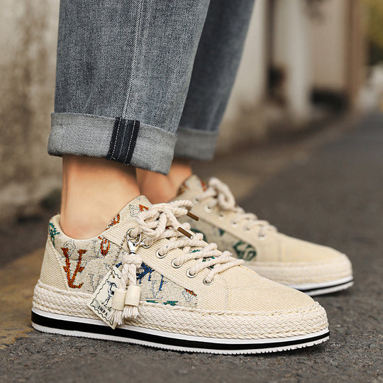 Damen Plateau-Espadrille-Sneaker mit besticktem Canvas, Quastenanhänger und geflochtener Bastsohle Shopy Nory