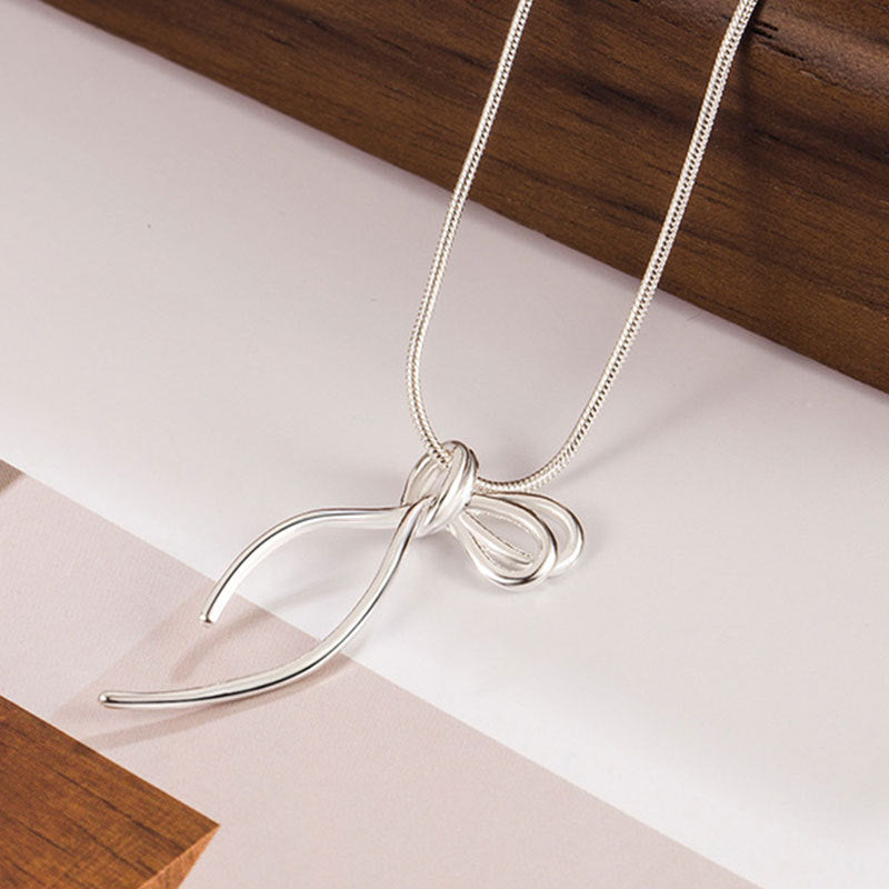 Damen Halskette mit kunstvollem Knotenanhänger Shop Nory
