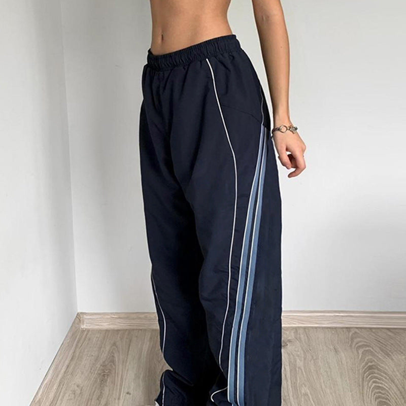 Damen nan sportive Trainingshose mit geradem Bein, elastischem Komfortbund und dekorativen Seitenpaspeln Shop Nory