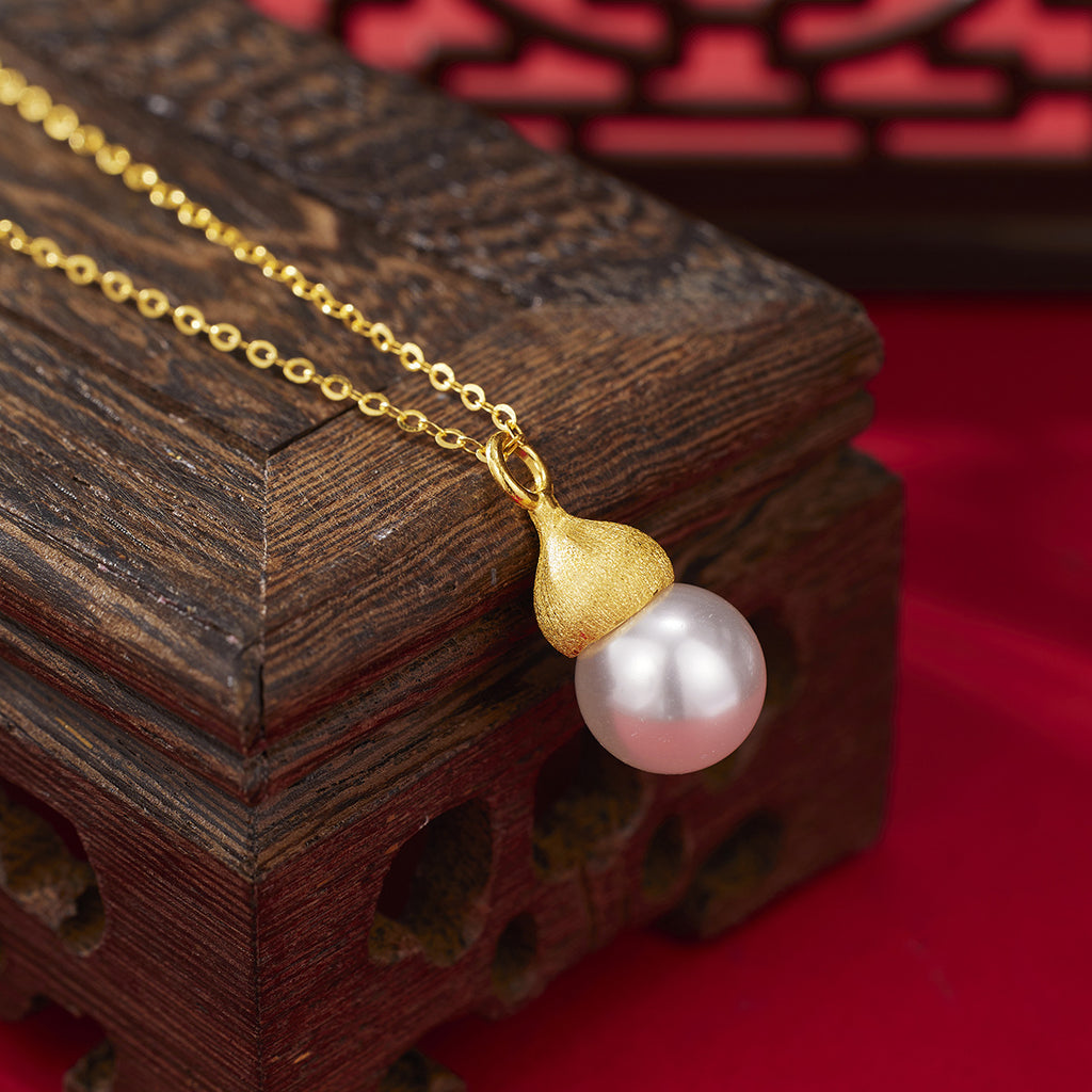 Damen elegante Halskette mit einzigartigem Perlenanhänger und goldener Detailverarbeitung Shop Nory