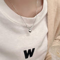 Damen Halskette mit elegantem Herzanhänger und filigraner Gliederkette Shop Nory