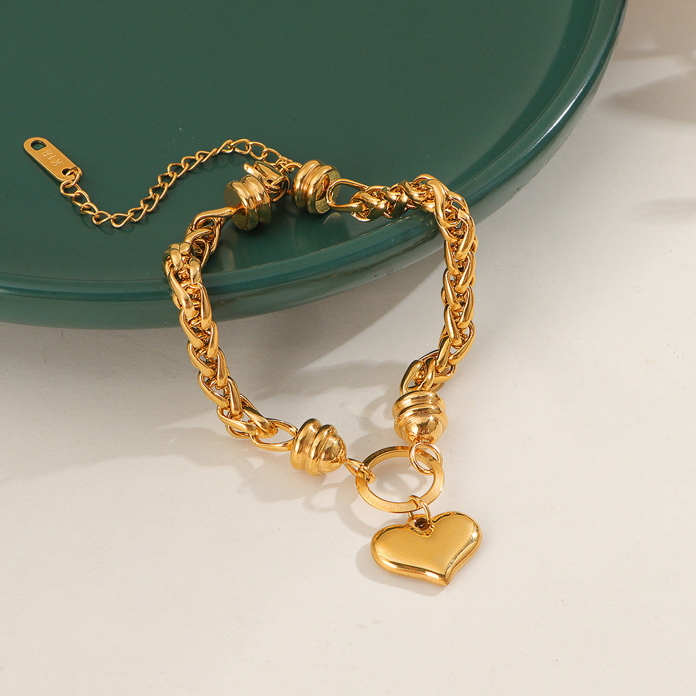 Damen liebevolles Armband mit herzförmigem Anhänger und kunstvollem Geflecht Shop Nory