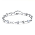 Damen Armband mit funkelnden Herz- und Zirkonia-Elementen Shop Nory