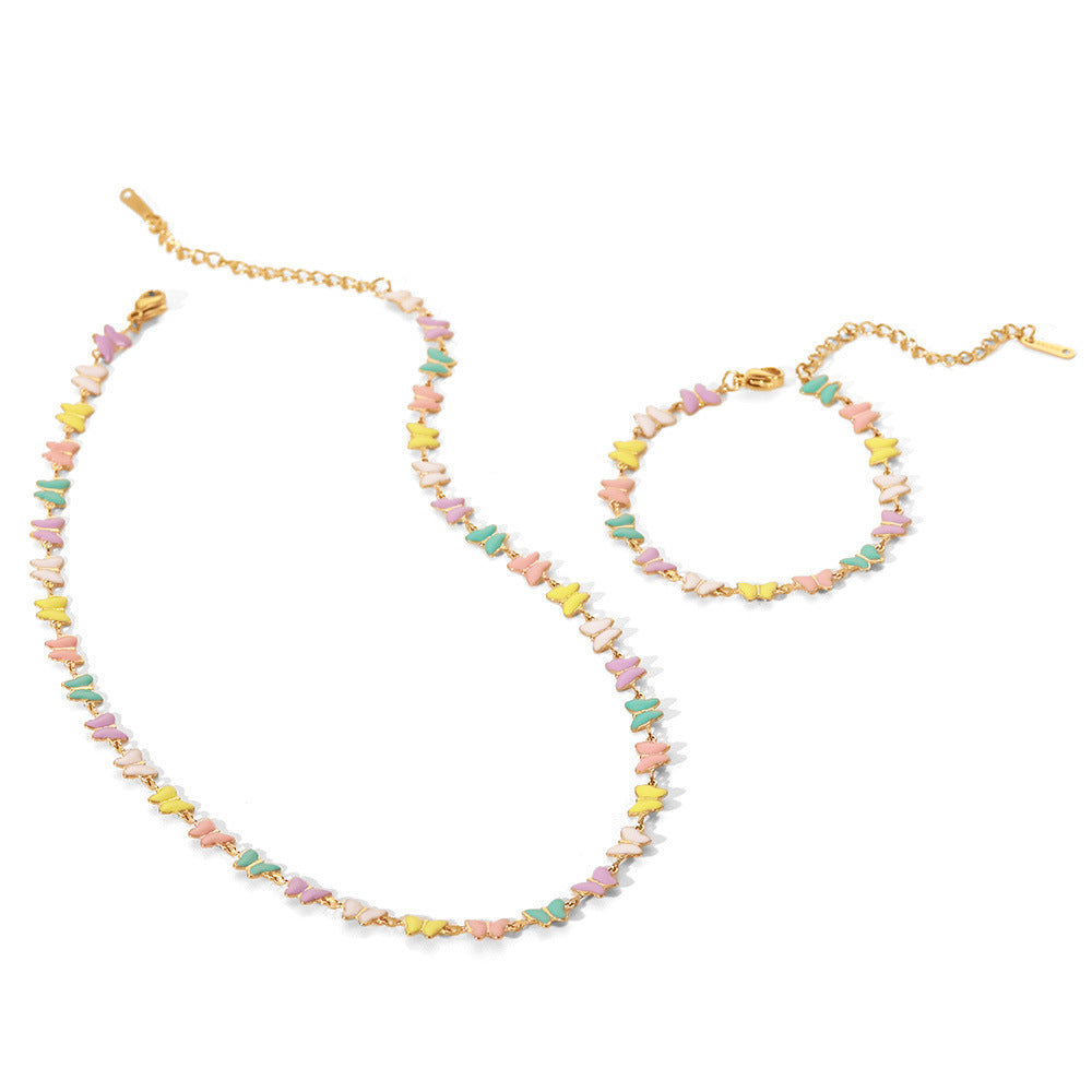 Damen Armband mit bunten Schmetterlingsanhängern aus Edelstahl Shop Nory