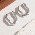 Damen moderne Creolen mit elegant geschwungenem Design Shop Nory