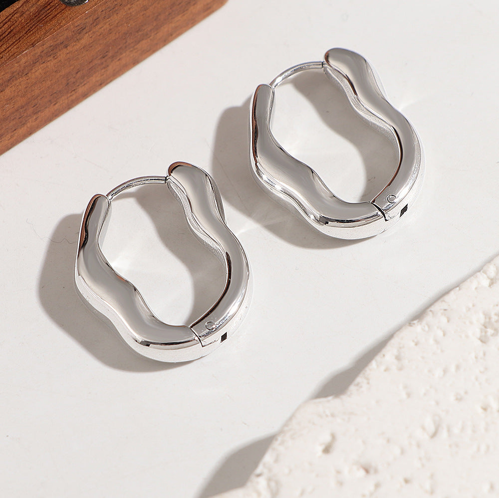Damen moderne Creolen mit elegant geschwungenem Design Shop Nory