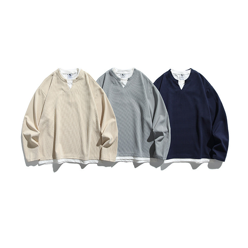 Unisex Oversize-Layering-Sweatshirt mit V‑Einsatz und sichtbarem Innenlayer Shop Nory