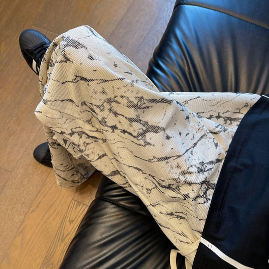 Herren Weit geschnittene Loungehose mit Marmorprint aus strukturiertem Jersey Shop Nory