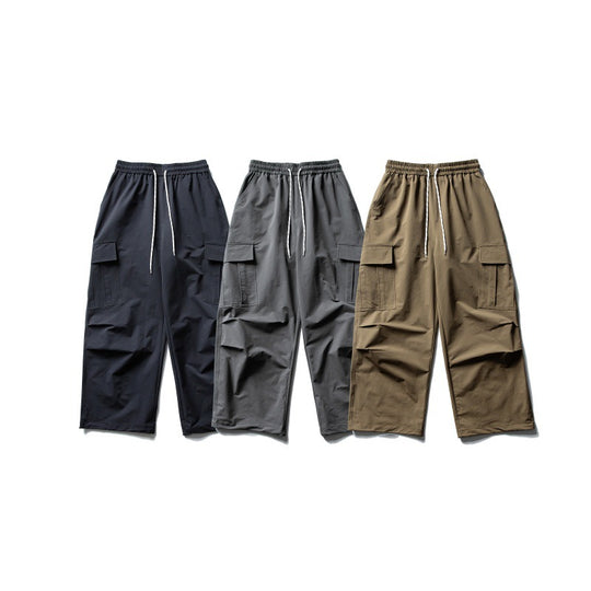 Unisex Weite Cargo-Utility-Hose im Baggy-Schnitt mit elastischem Kordelbund und großzügigen Klappentaschen Shop Nory
