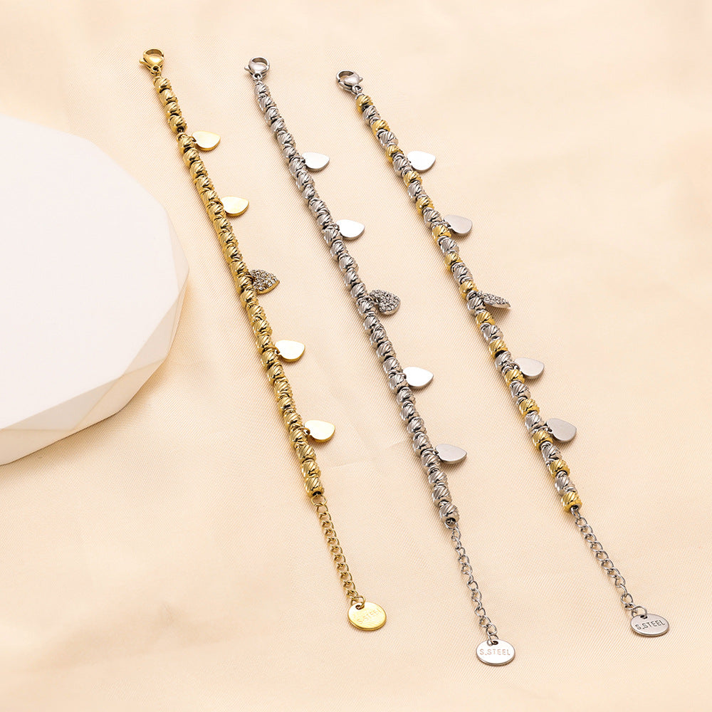 Damen Armband mit herzförmigen Anhängern und funkelndem Zirkonia Shop Nory