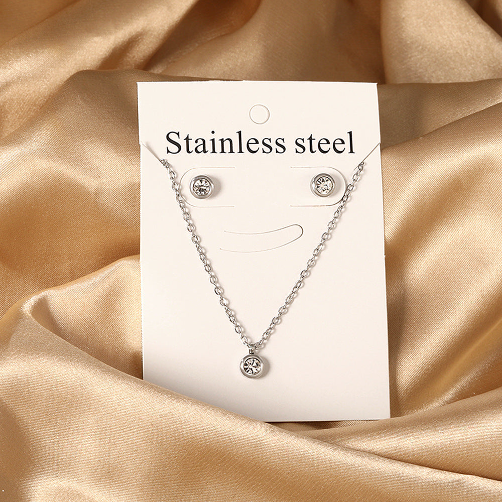 Damen Schmuckset mit Zirkon-Anhänger und dazu passenden Ohrsteckern Shop Nory