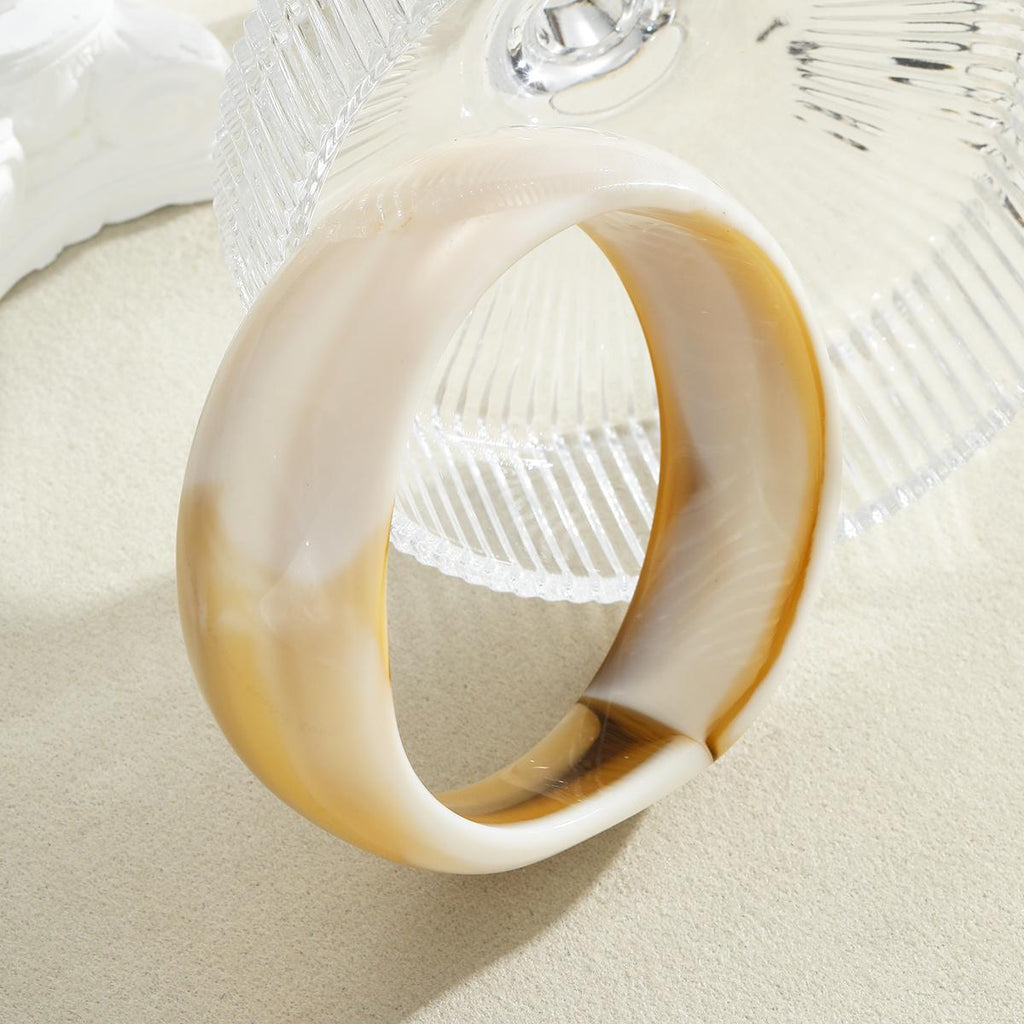 Damen Acrylarmband mit elegantem, geschwungenem Design Shop Nory