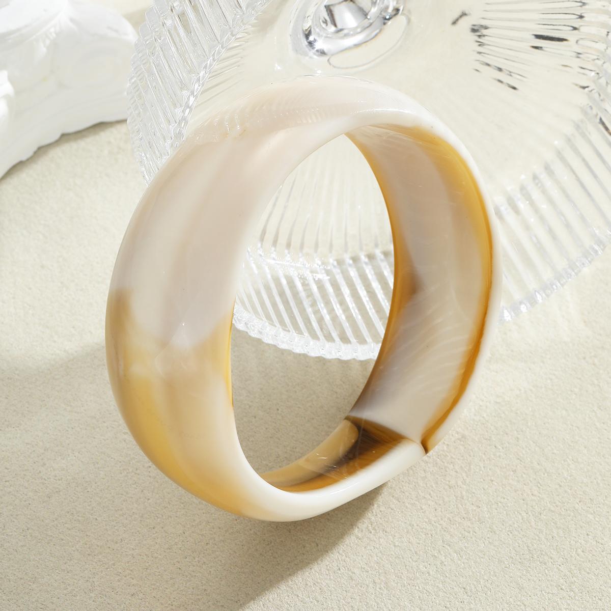 Damen Acrylarmband mit elegantem, geschwungenem Design Shop Nory