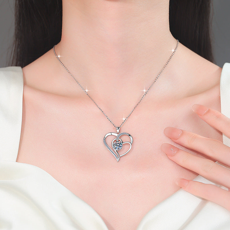 Damen Halskette mit herzförmigem Anhänger und funkelndem Zirkonia Shop Nory
