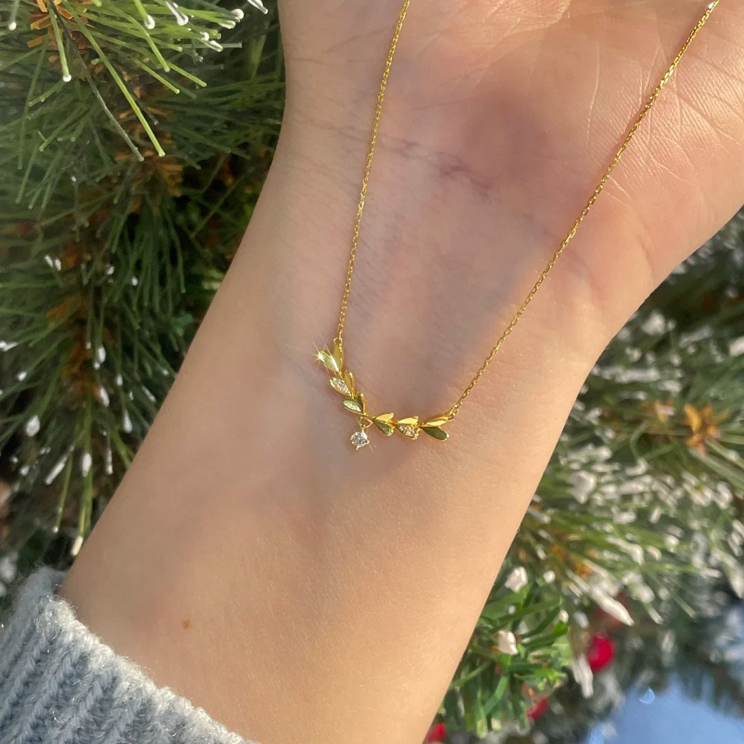 Damen Halskette mit filigranem Blattmotiv und funkelnden Zirkonia Shop Nory