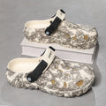 Damen Komfortable Clogs mit verstellbarem Riemen und floralem Design