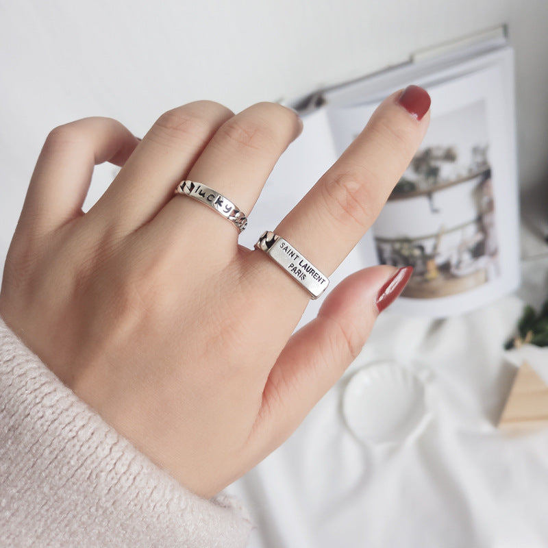 Damen Offener Ring mit geflochtenem Design und markantem Schriftzug Shop Nory