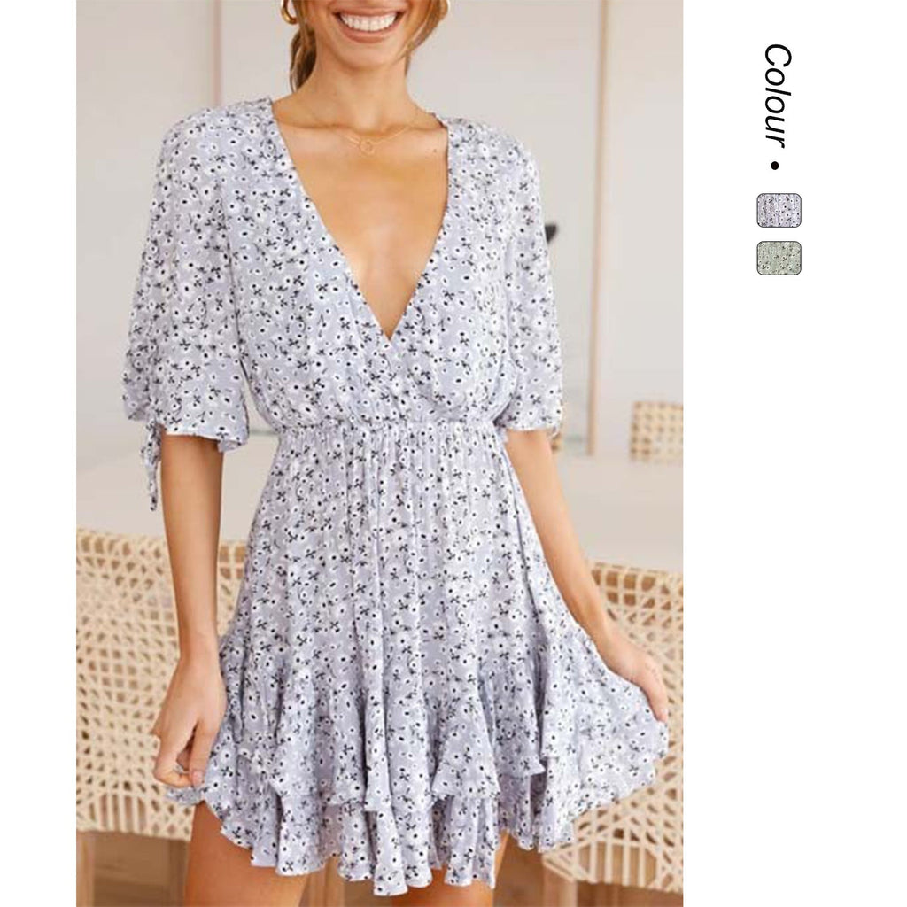Damen Mini-Kleid mit verspieltem Blumendruck und fließendem Saum