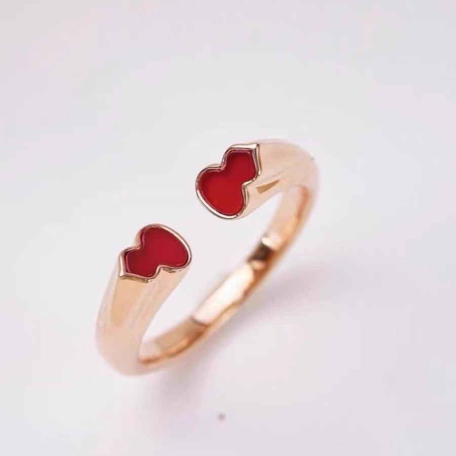 Damen Armband mit herzförmigem Anhänger und funkelnden Kristallen Shop Nory