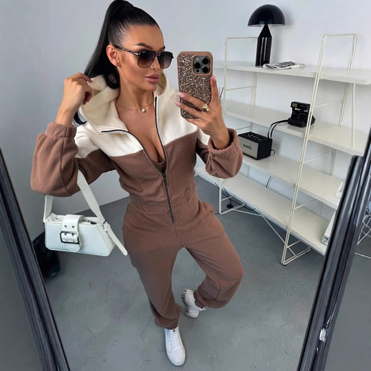 Damen gemütlicher Fleece-Overall mit Kapuze, durchgehendem Reißverschluss und elastischen Bündchen Shop Nory