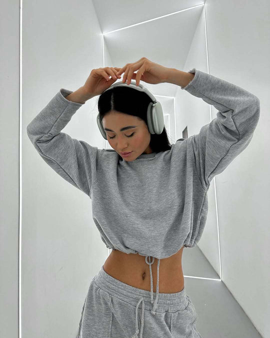 Damen kurzes Sweatshirt mit Kordelzug und Oversize-Ärmeln Shop Nory