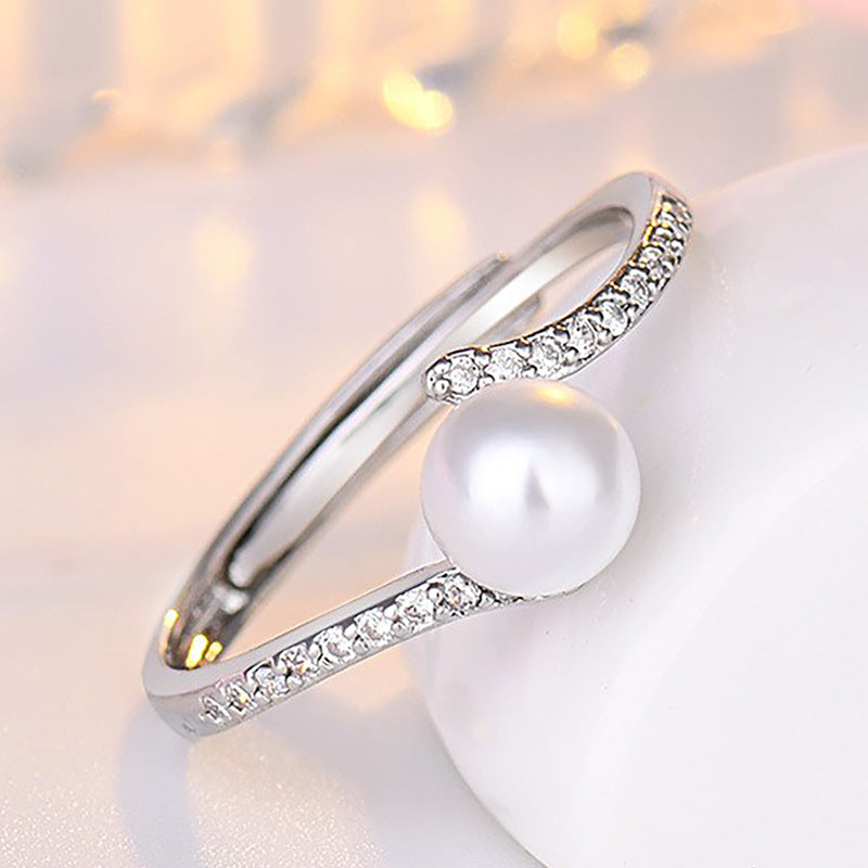 Damenring mit eleganter Perle und funkelndem Zirkonia-Besatz Shop Nory