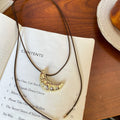 Damen Halskette mit einzigartigem Croissant-Anhänger Shop Nory