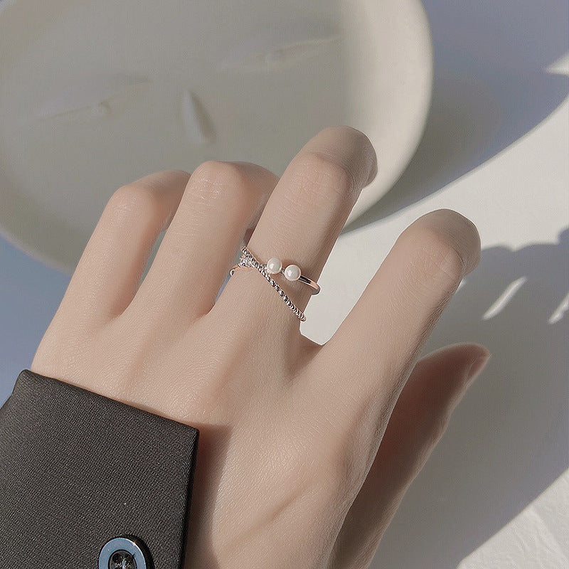 Damenring mit doppelter Perlenverzierung und elegantem Flecht-Design Shop Nory