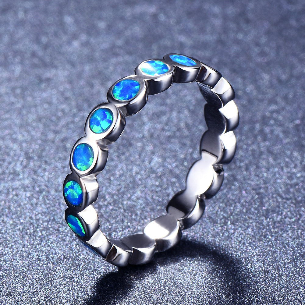 Damen Ring mit schillernden Opalsteinen und eleganter Edelstahlfassung Shop Nory